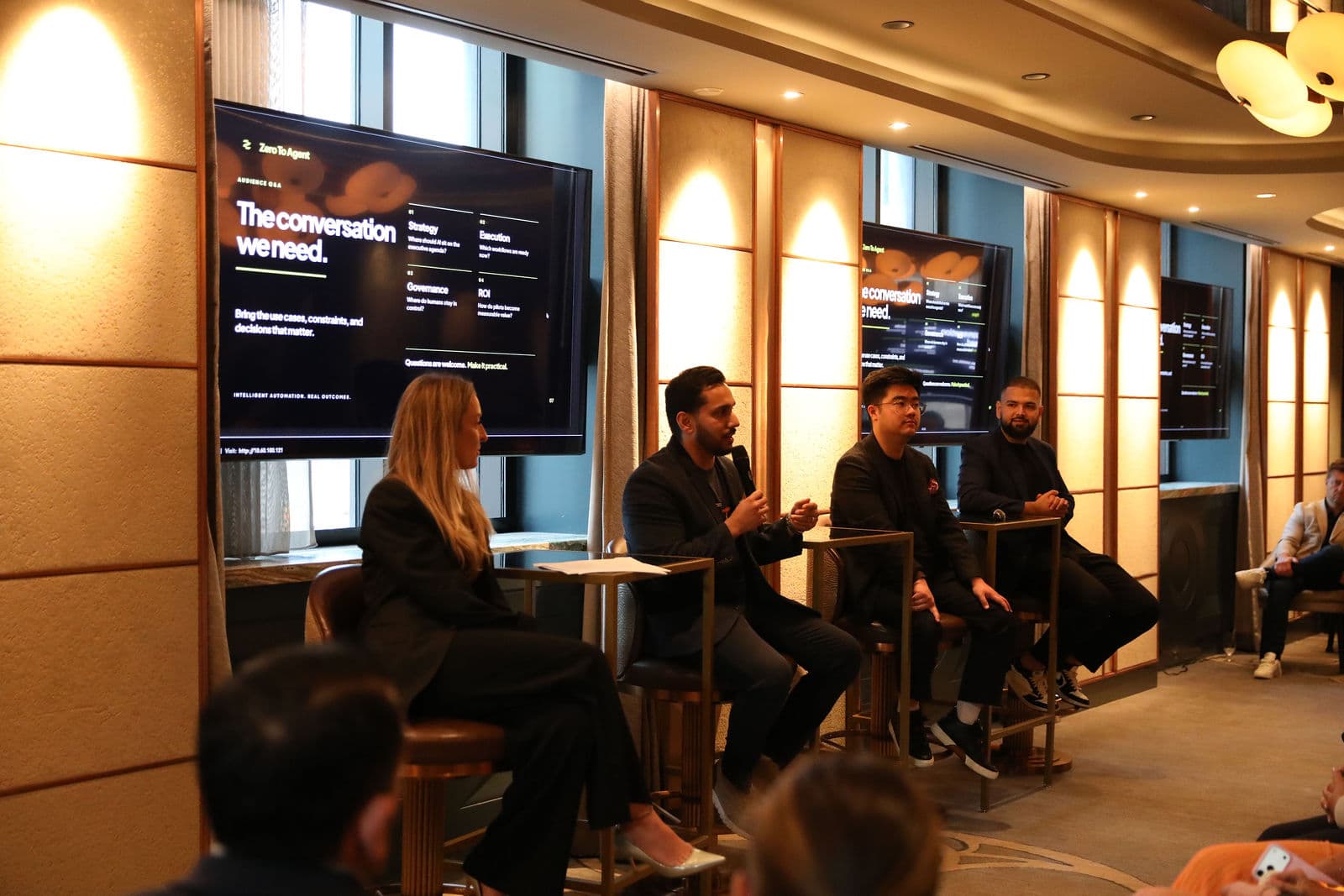 A panel of four speakers in front of a full room at Zero to Agent's Toronto Tech Week 2026 event