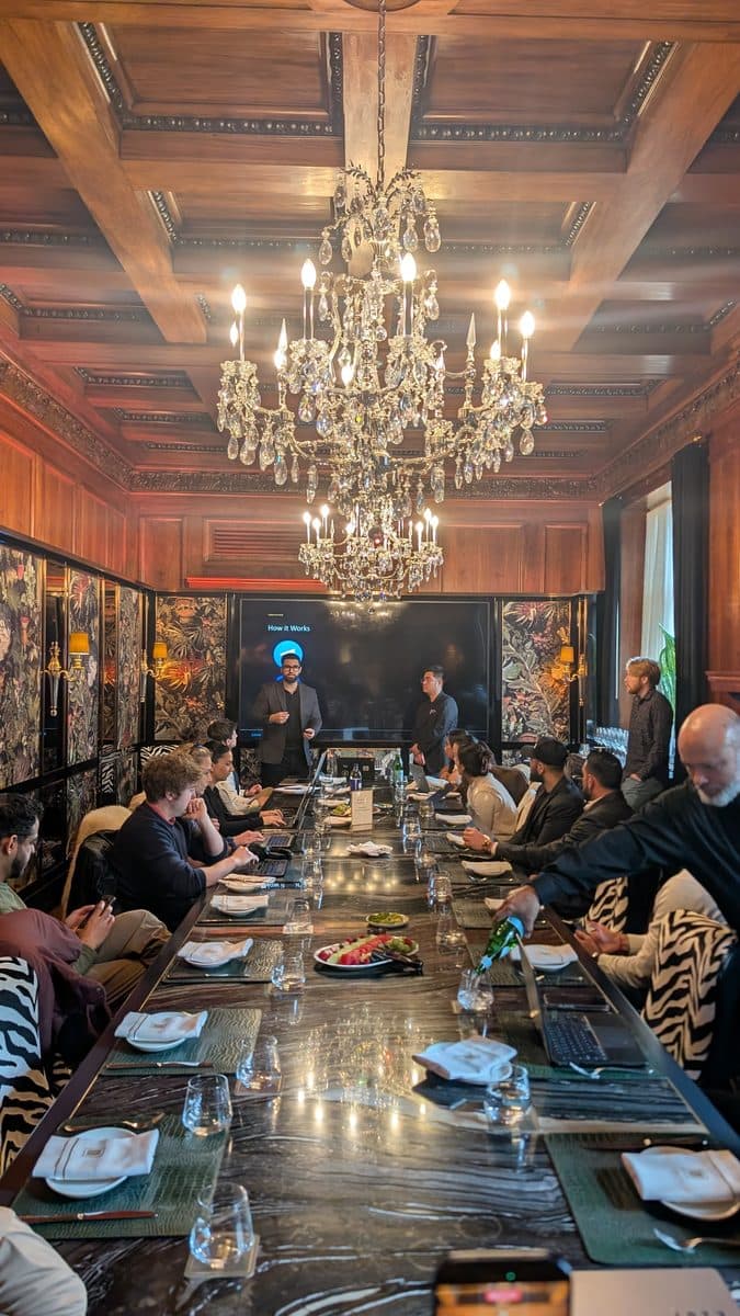 A small group working around a long table at a Zero to Agent session